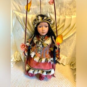 NATIVE AMERICAN PORCELAIN DOLL
